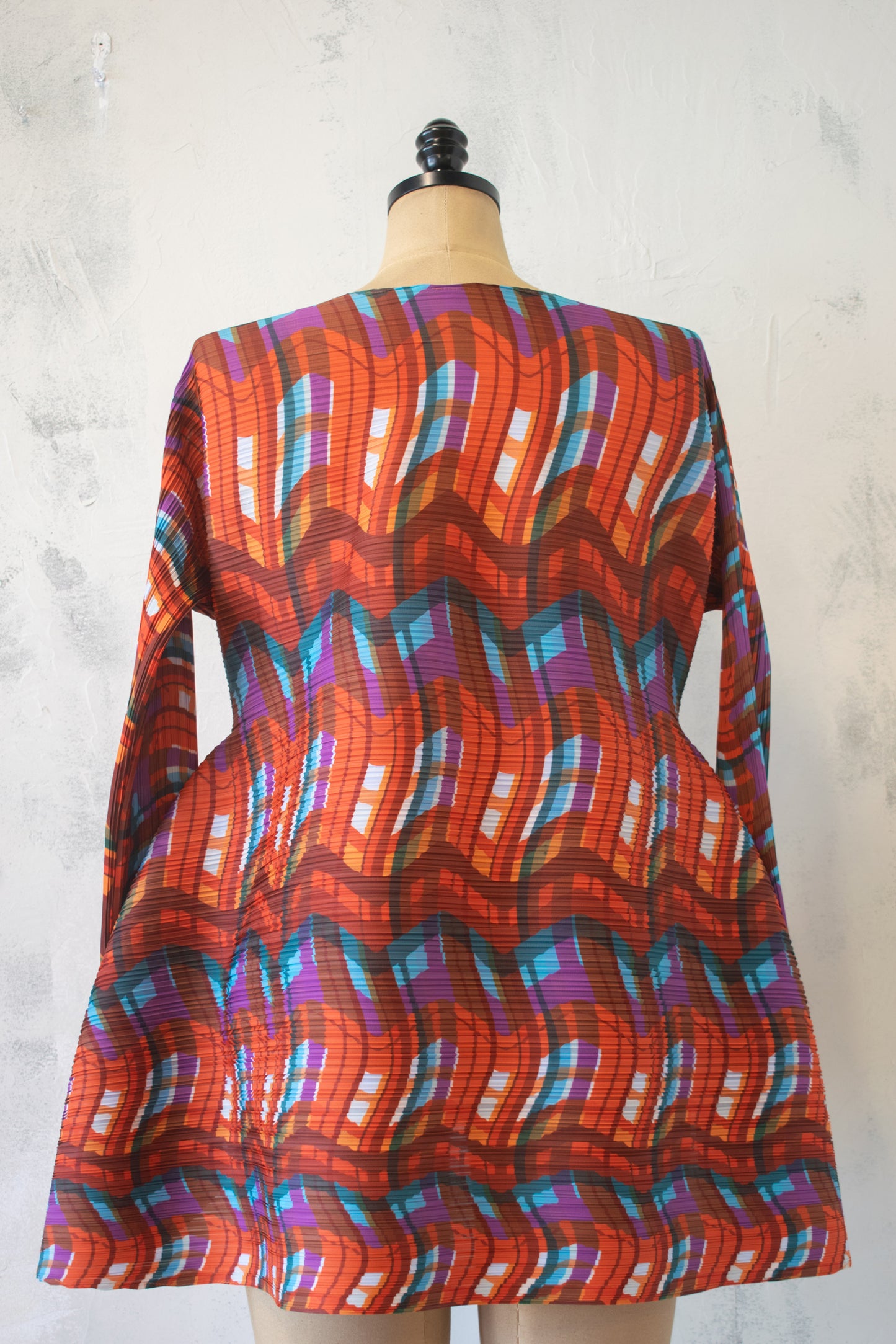 Vanite Couture; Graphic Permanent Pleat Top