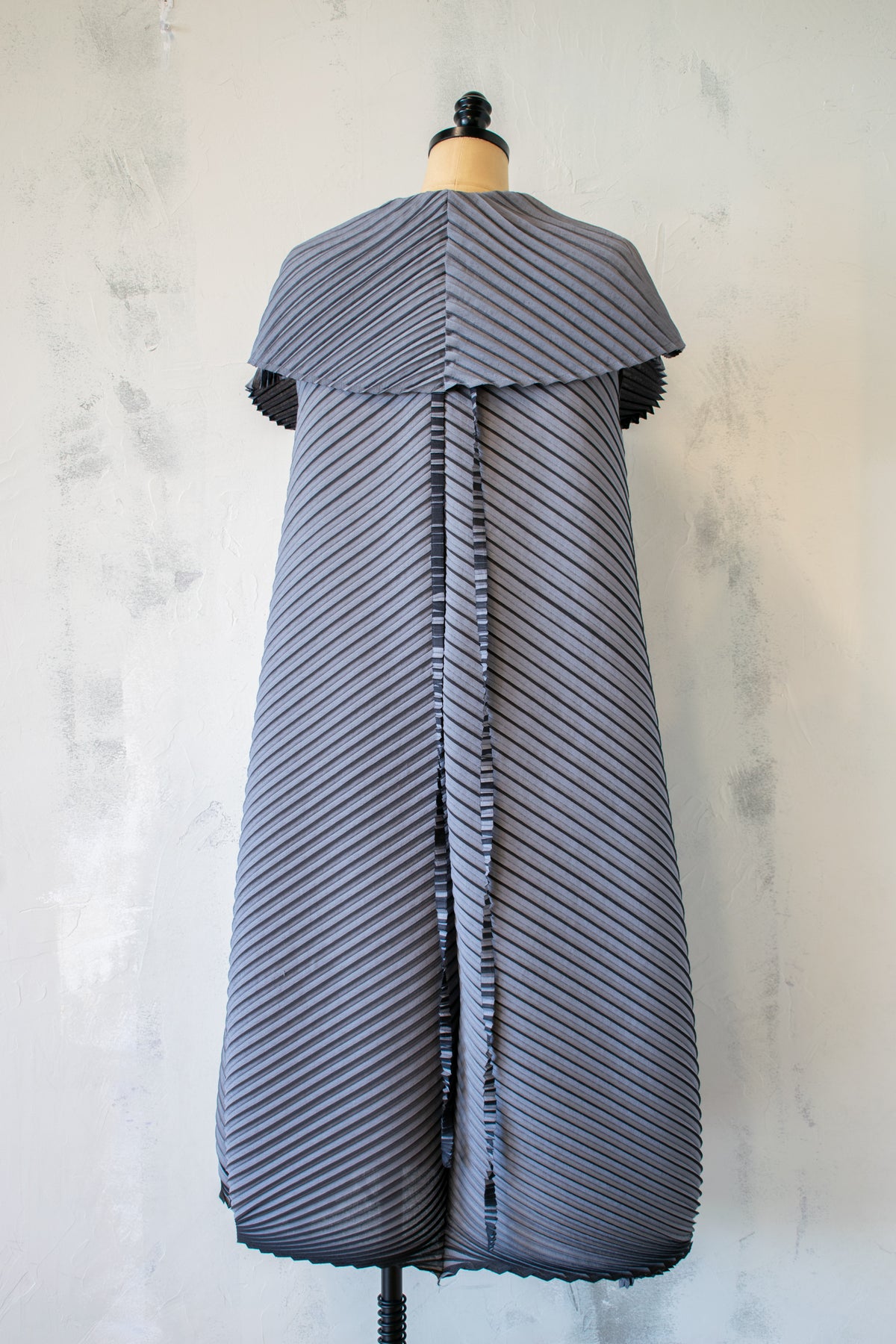 MC Oasis; Pleated Vest