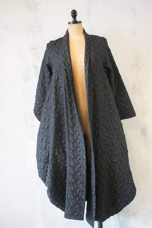 Amma; Pyramid Coat