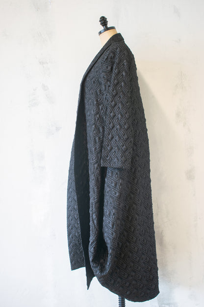 Amma; Pyramid Coat
