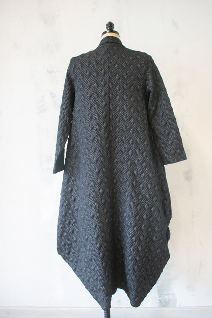 Amma; Pyramid Coat