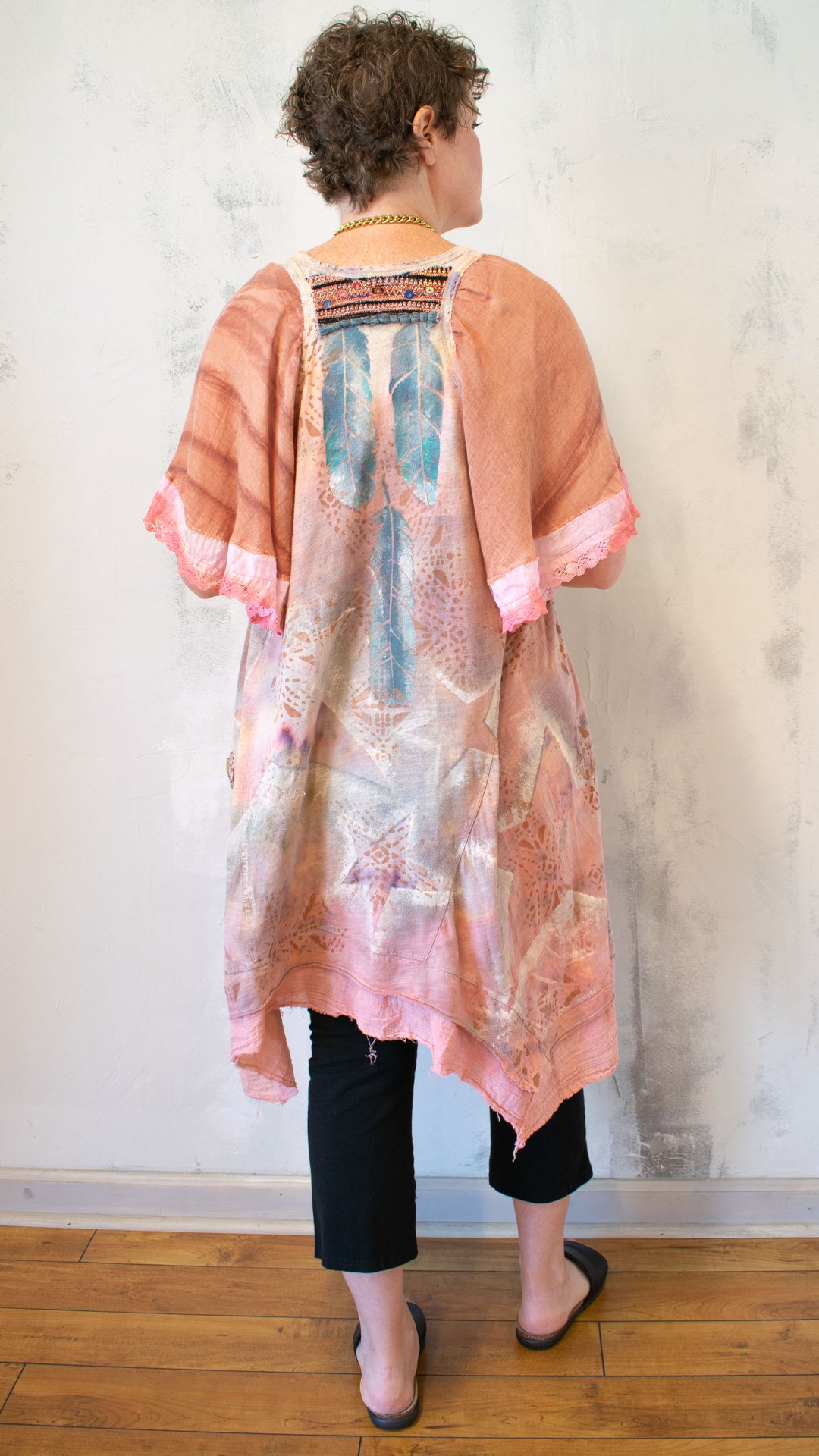 The Divine Tunic in Aura Glow