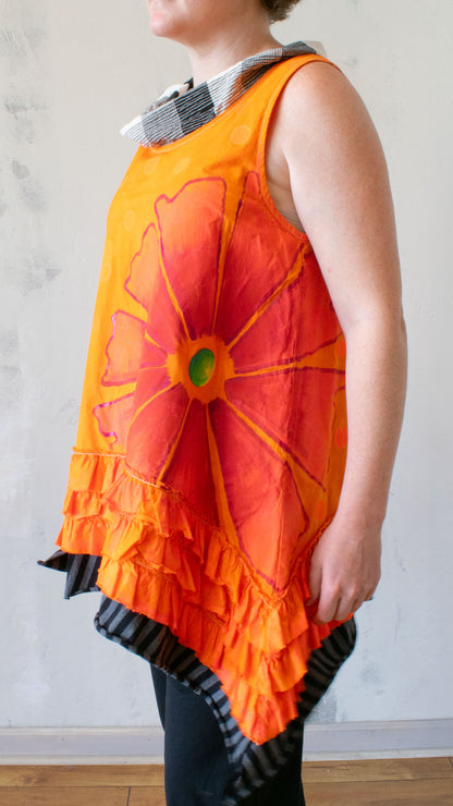 Petal Pusher Peplum top in Orange Crush