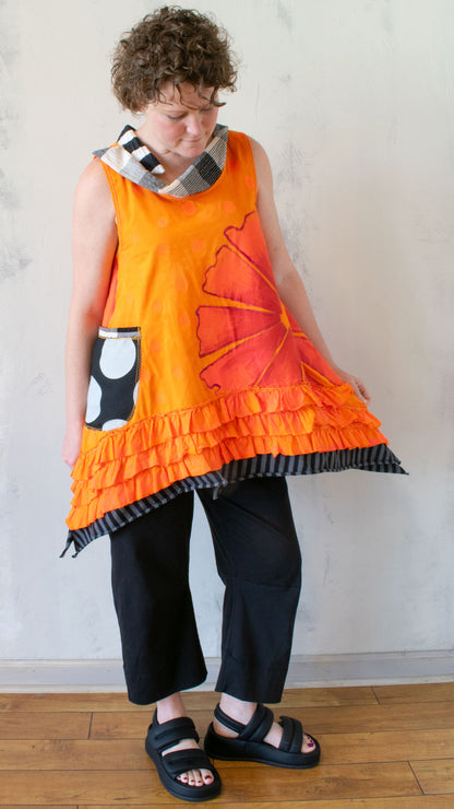 Petal Pusher Peplum top in Orange Crush