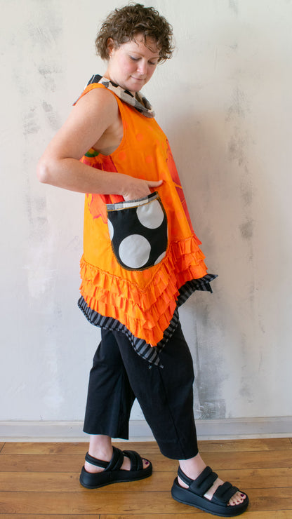 Petal Pusher Peplum top in Orange Crush