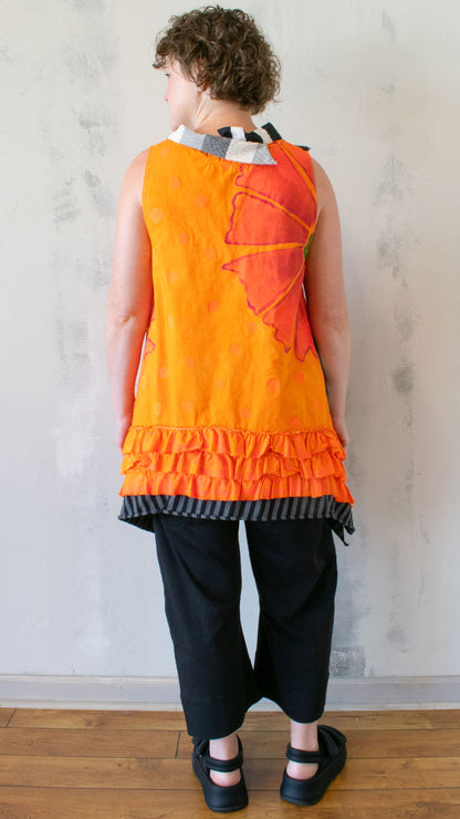 Petal Pusher Peplum top in Orange Crush