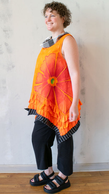 Petal Pusher Peplum top in Orange Crush