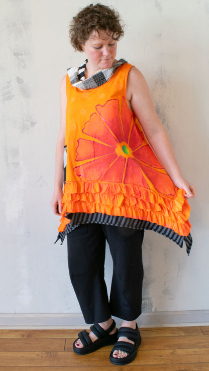 Petal Pusher Peplum top in Orange Crush