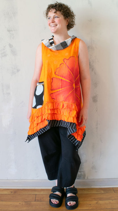 Petal Pusher Peplum top in Orange Crush