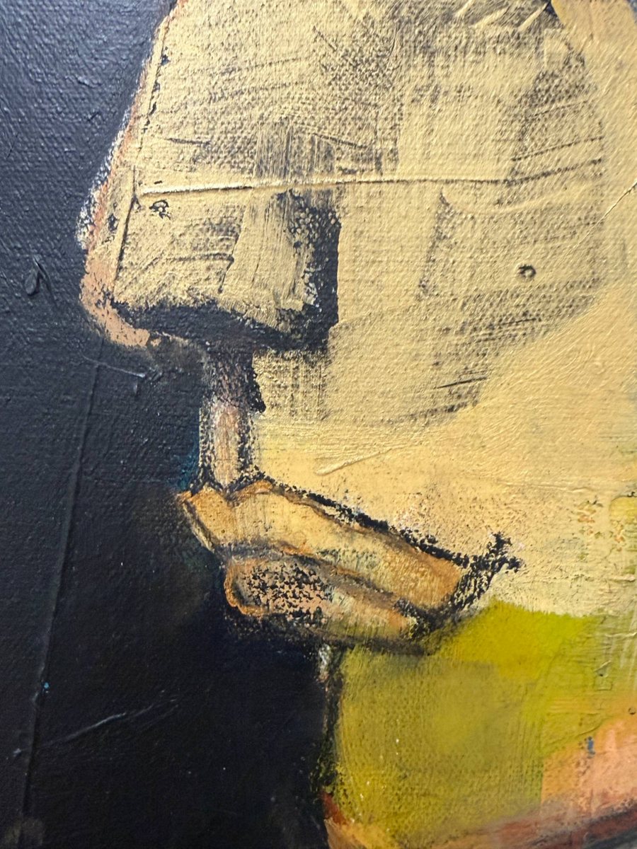 Detail of a painted face in gold and black, at Pure Space, Gaia